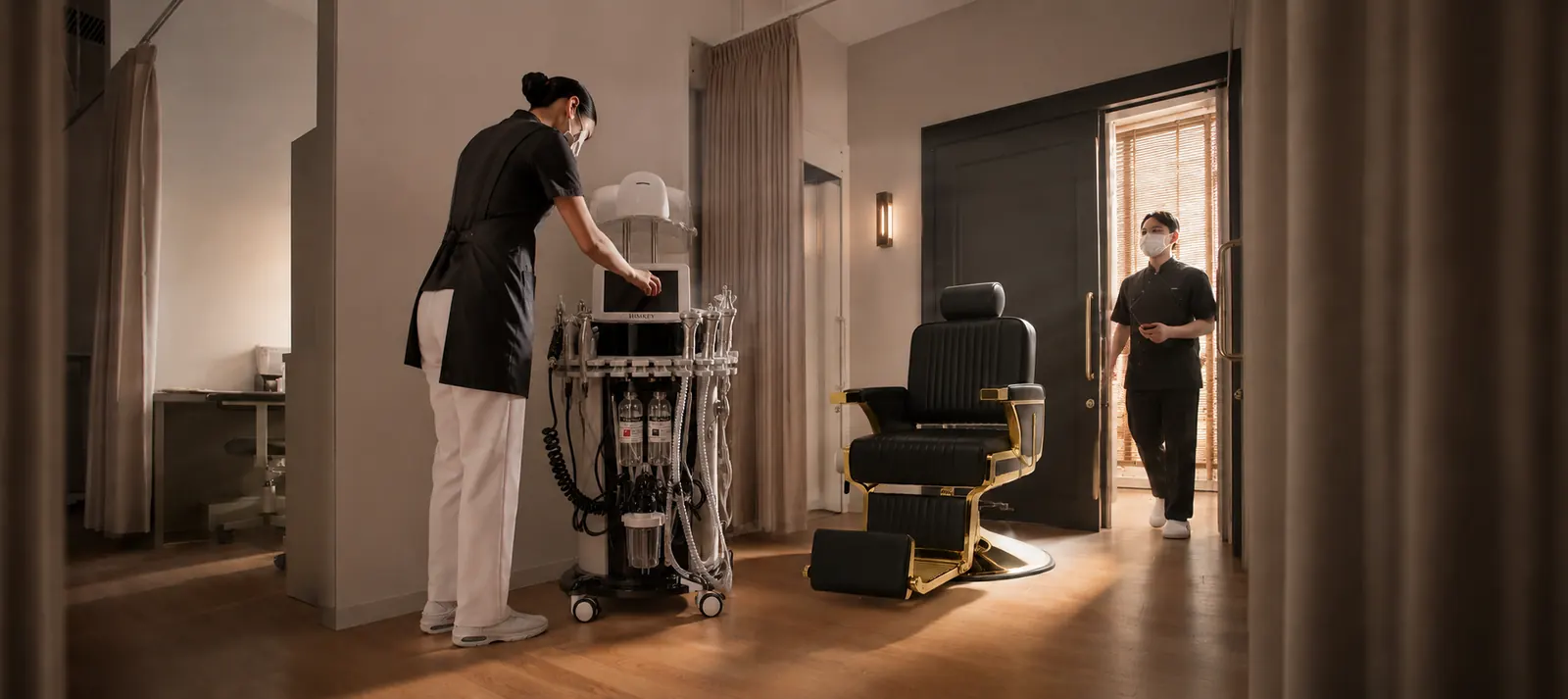 Blessed Kings HIMKEY facial machine and gold barber chair